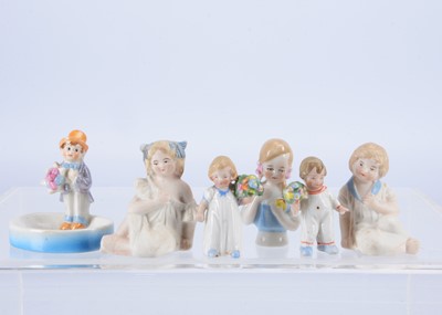 Lot 299 - A pair of German porcelain children