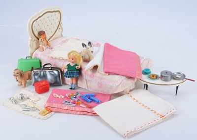 Lot 335 - A doll bed and accessories