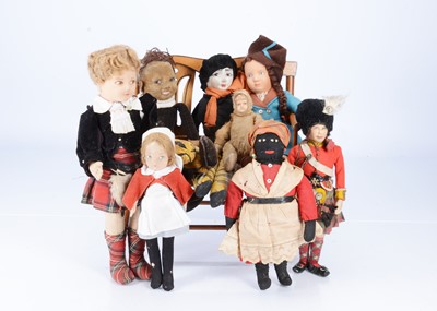 Lot 361 - Eight cloth dolls to restore