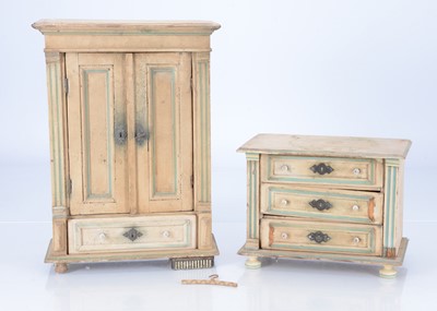 Lot 369 - A late 19th century doll's wardrobe and chest of drawers