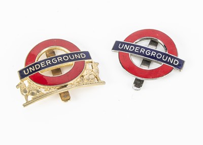 Lot 593 - Enamelled London Underground Logo Cap Badges (2)