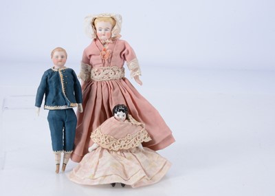 Lot 406 - A German bisque shoulder head boy dolls' house doll