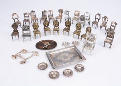 Lot 428 - Four continental white metal dolls' house plates