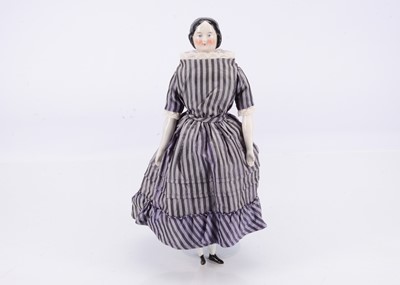 Lot 454 - A fine 19th century pink tinted china shoulder head lady doll