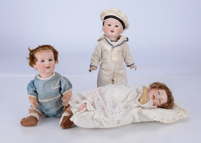Lot 497 - A Kestner 211 baby doll in layette