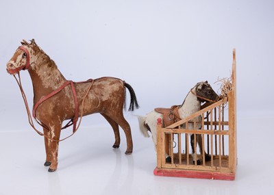 Lot 520 - A large 19th century skin covered toy horse
