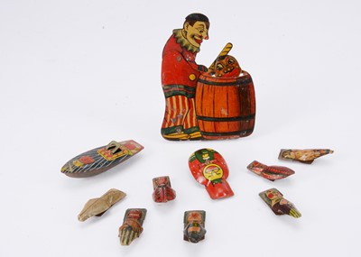 Lot 528 - A Japanese lithographed tinplate pressure operated clown toy