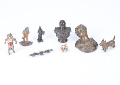 Lot 550 - A cold painted bronze of cat tieing her corset