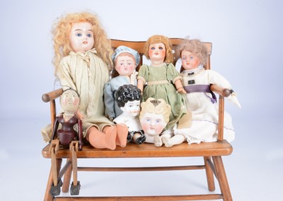 Lot 558 - Two British bisque shoulder head dolls