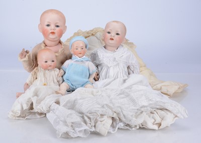 Lot 568 - Four German bisque dome head baby doll