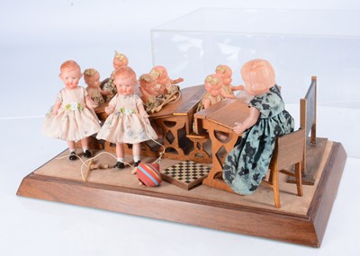 Lot 581 - A school scene with small celluloid and plastic dolls