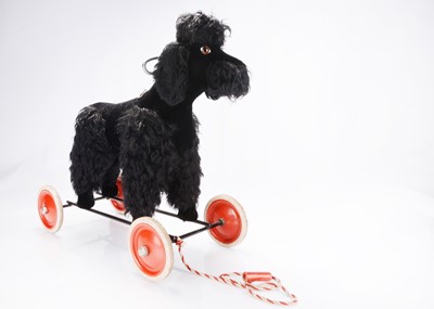 Lot 603 - A post-war Steiff black Snobby pull along poodle, 1956-1969