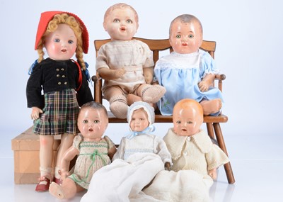 Lot 628 - Six composition dolls