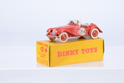 Lot 54 - A Dinky Toys 108 M.G Midget Sports