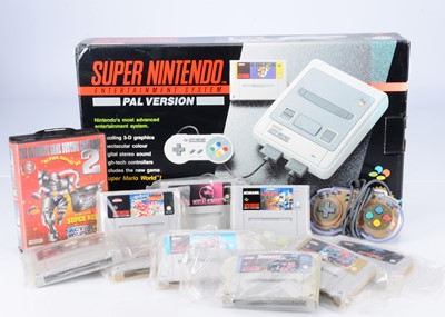 Lot 436 - A Super Nintendo SNES Games Console & Games