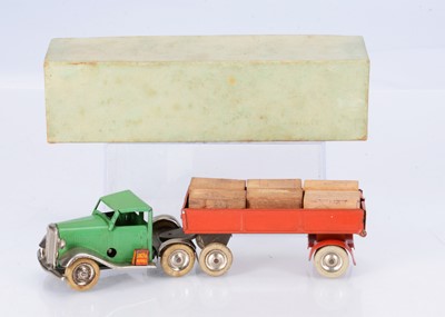 Lot 579 - A Tri-ang Minic Tinplate Clockwork 40M Pre-War Articulated Lorry With Cases