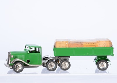 Lot 580 - A Tri-ang Minic Tinplate Clockwork 40M Post-War Articulated Lorry With Cases