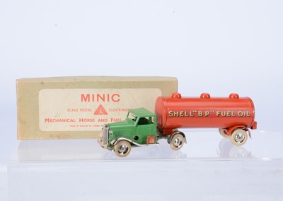 Lot 615 - A Tri-ang Minic Tinplate Clockwork 31M Pre-War Articulated Oil Tanker