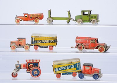 Lot 668 - Small Japanese & German Tinplate Clockwork Commercial Vehicles