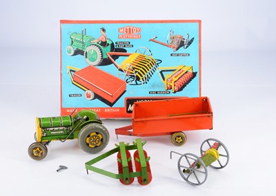 Lot 675 - A Mettoy Tinplate Clockwork Modern Farming Mechanical Tractor Set No.3262/2468