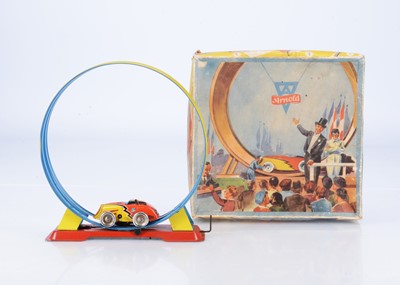 Lot 683 - A 1950's Arnold Tinplate Clockwork Loop The Loop Fairground Toy No.549/1