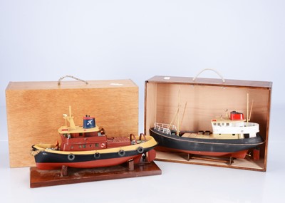 Lot 708 - Plastic kitbuilt Radio Controlled Trawler and Tug Model Boats both in wooden carry cases (2)