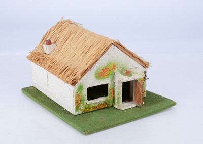 Lot 833 - Britains very unusual wooden 'Thatched Farm House, roof opens' from Farm Series set 170F