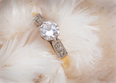 Lot 19 - A diamond 18ct gold solitaire ring