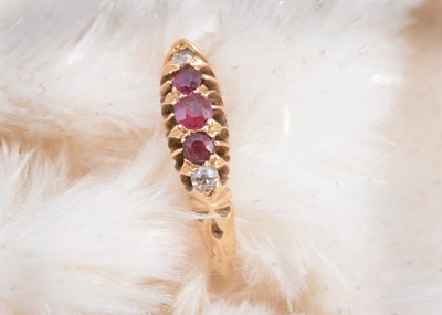 Lot 20 - A Victorian 18ct gold ruby and diamond five stone dress ring