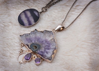 Lot 38 - A blue john silver set oval pendant