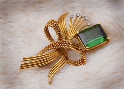 Lot 48 - A continental tourmaline and diamond bow brooch