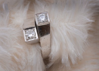 Lot 52 - A continental white gold 14k marked diamond crossover dress ring