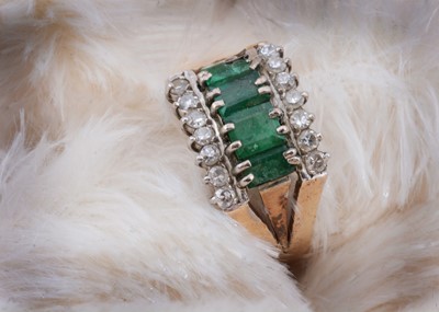 Lot 53 - A continental 14k marked emerald and diamond dress ring