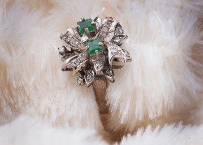 Lot 56 - A 14ct gold emerald and diamond cocktail dress ring