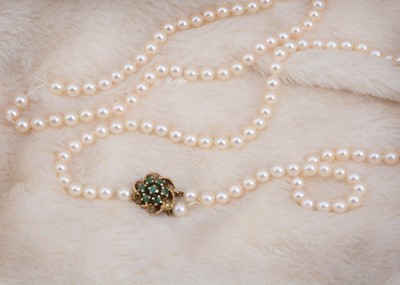 Lot 63 - A double row of uniform strung pearls