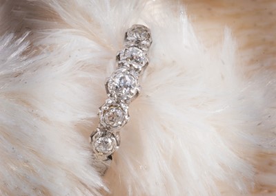 Lot 95 - A five stone diamond 18ct gold and platinum set dress ring