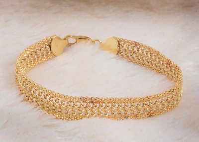 Lot 102 - A 9ct gold diamond flattened link bracelet