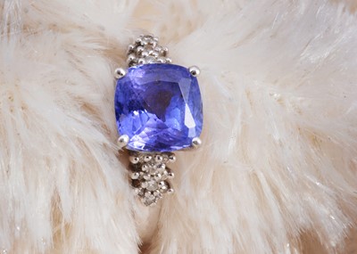 Lot 111 - A platinum tanzanite and diamond set QVC dress ring
