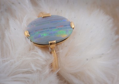 Lot 126 - An 18ct gold opal single stone dress ring