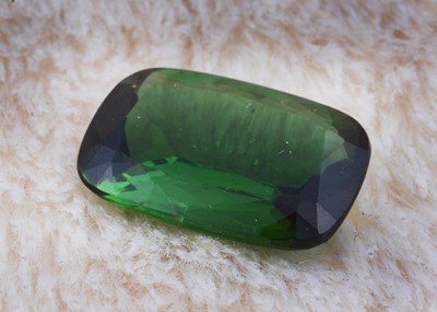 Lot 147 - A green tourmaline loose gem stone