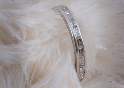 Lot 152 - A full diamond white metal eternity ring