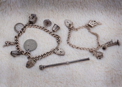 Lot 158 - Two silver charm bracelets