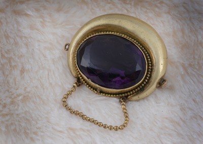 Lot 188 - A late 19th Century continental paste set and gilt metal ovoid brooch