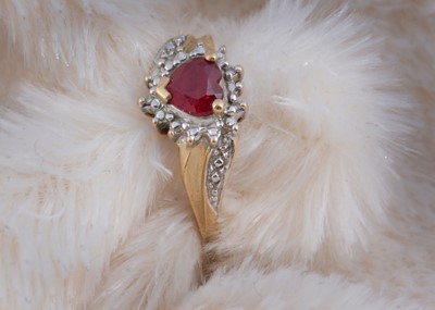 Lot 237 - A 9ct gold red paste dress ring