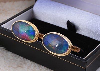 Lot 249 - A pair of Australian 9ct marked black opal cufflinks