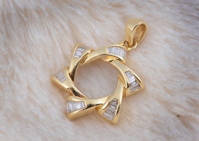 Lot 250 - An 18ct yellow gold diamond set 'Star of David' pendant