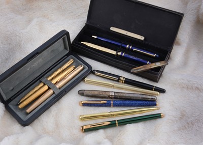 Lot 271 - A small collection of pens and two pocket knives