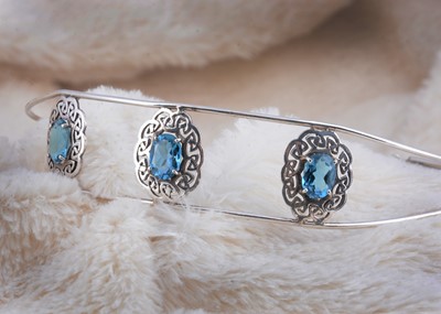 Lot 272 - A Celtic topaz set neck collar