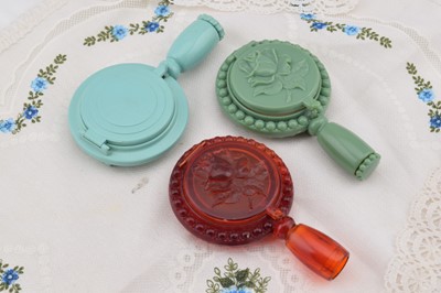 Lot 294 - Three plastic hand held compacts