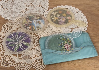 Lot 299 - A Klix Made in England circular plastic hand mirror